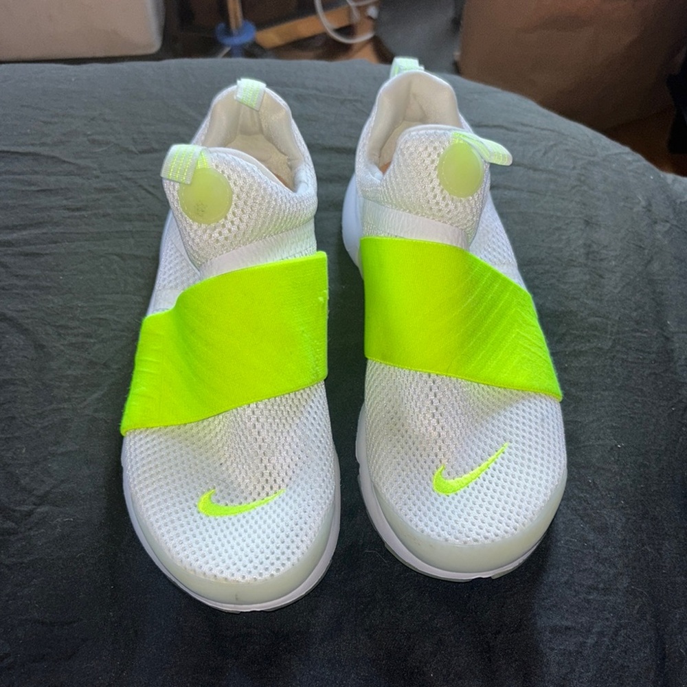 Nike White and Green Slip-On Sneakers with Modern Design
